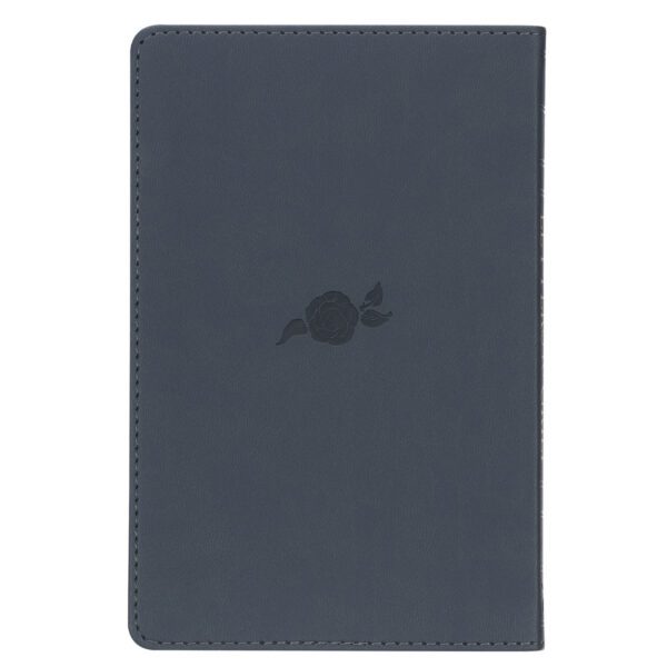 Dark gray notebook with rose embossing.