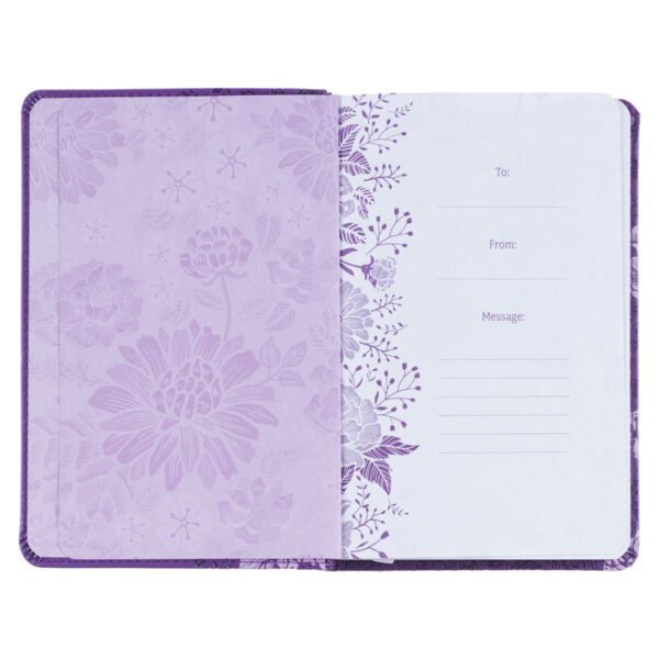 Purple floral guest book open.