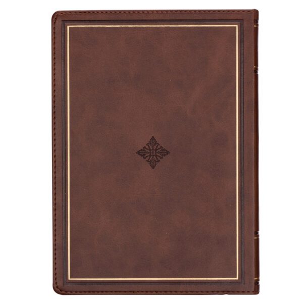 Brown leather journal, embossed design.