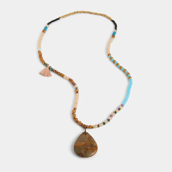 Beaded necklace with stone pendant.