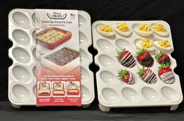 Deviled eggs and chocolate strawberries tray.